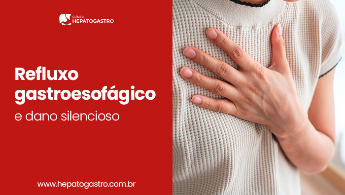 Refluxo Gastroesofágico: O Dano Silencioso 1 Pessoa Com A Mão No Peito, Indicando Possível Dor Ou Desconforto Na Região Torácica.