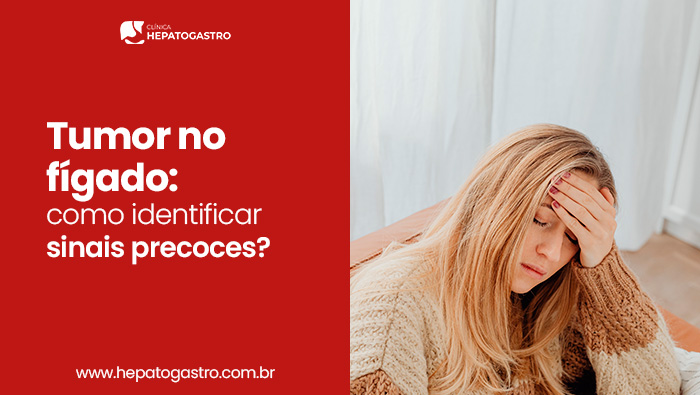 Tumor No Fígado: Como Identificar Sinais Precoces? 1 Mulher Sentada Com A Mão Na Testa, Expressão De Preocupação Ou Mal-Estar Em Ambiente Interno.